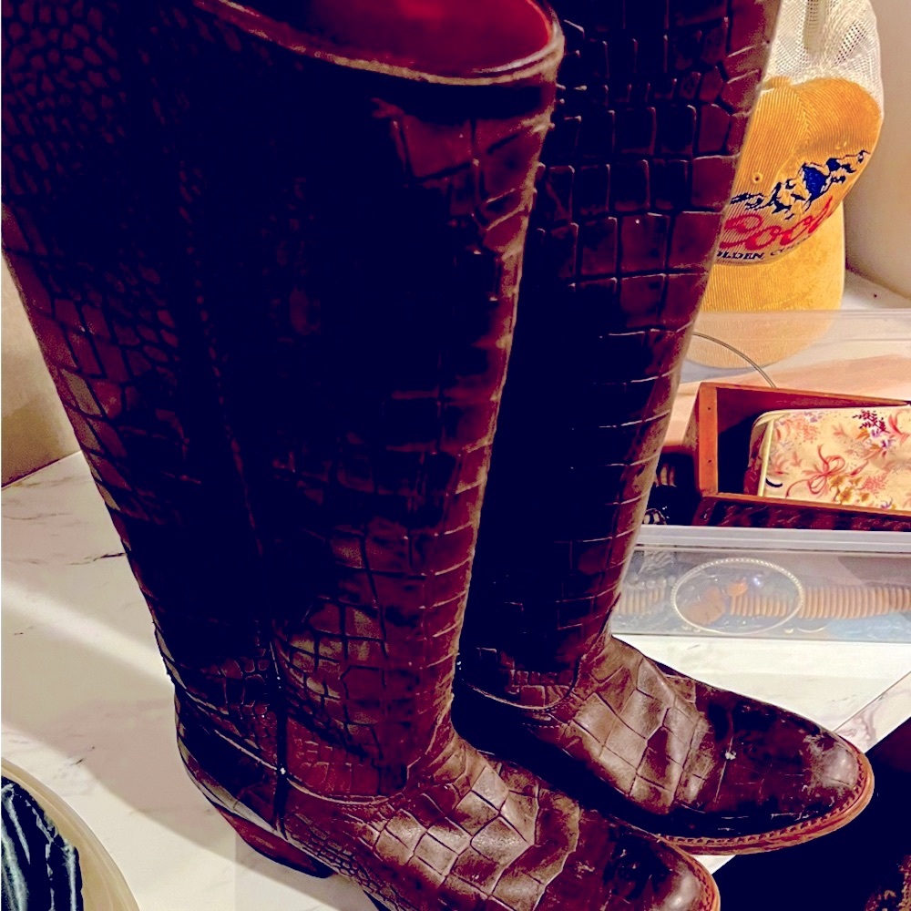 Almost knee high. Comfy boots.